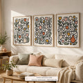 Joyful Garden set of three paintings framed in a living room